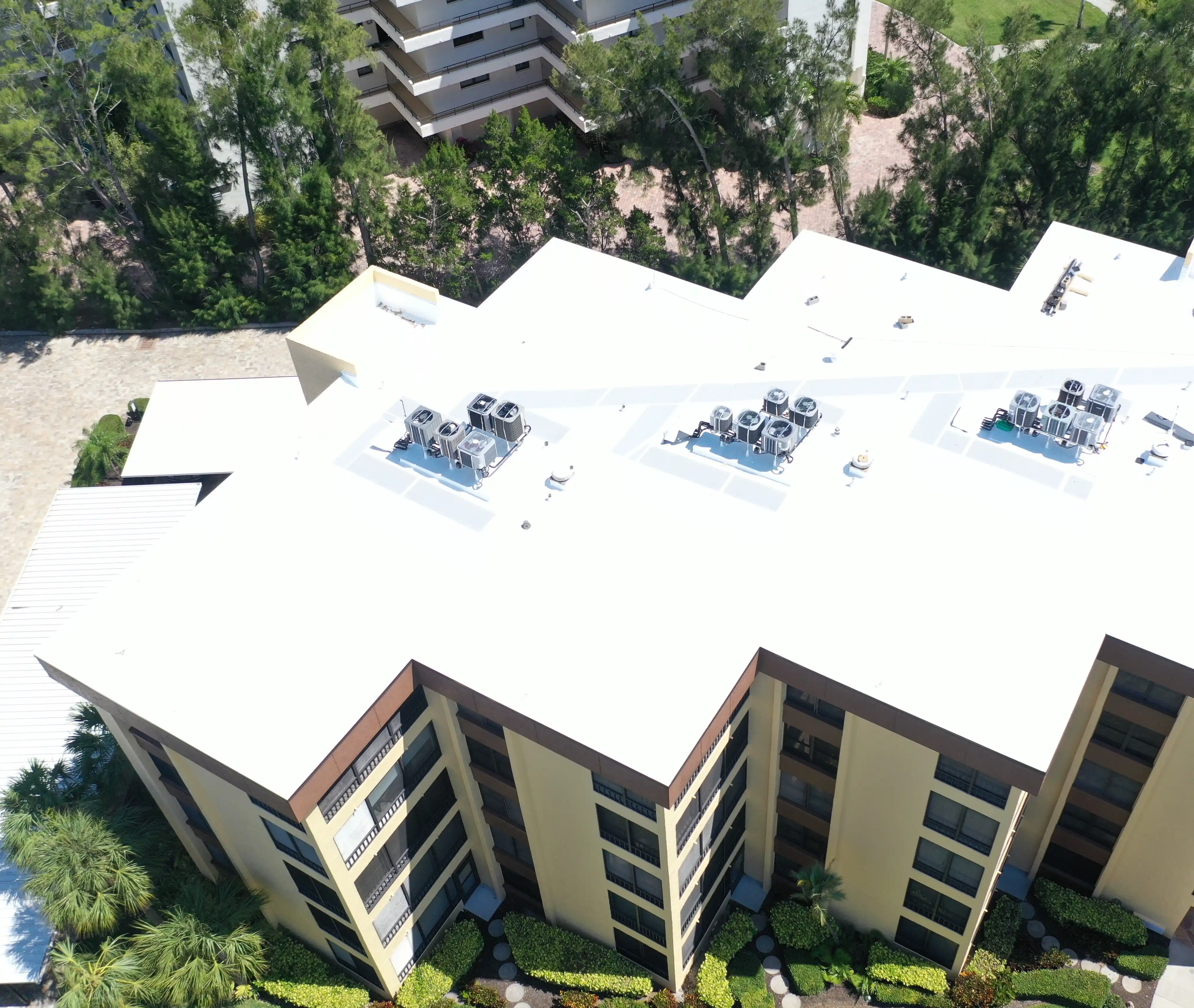Flat roof condo roofer Sarasota